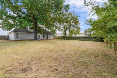 Eastside Greenwood Charmer with a tiled living room and on Vache-Grasse Country Club in Arkansas - for sale on GolfHomes.com, golf home, golf lot