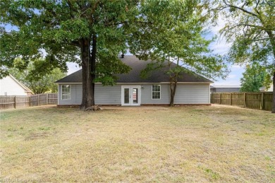 Eastside Greenwood Charmer with a tiled living room and on Vache-Grasse Country Club in Arkansas - for sale on GolfHomes.com, golf home, golf lot