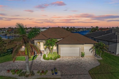 Fall in love with this 2015 built custom waterfront pool home on Saint Andrews South Golf Club in Florida - for sale on GolfHomes.com, golf home, golf lot