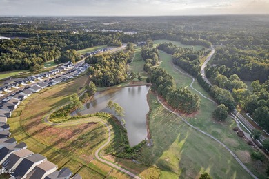 Skip the dust and noise of ongoing construction. This move-in on Falls Village Golf Course in North Carolina - for sale on GolfHomes.com, golf home, golf lot