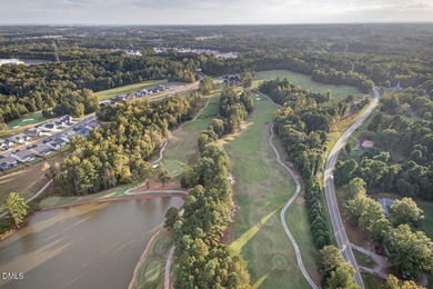 Skip the dust and noise of ongoing construction. This move-in on Falls Village Golf Course in North Carolina - for sale on GolfHomes.com, golf home, golf lot