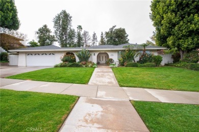 Welcome to this stunning one-story private pool home that backs on Canyon Crest Country Club in California - for sale on GolfHomes.com, golf home, golf lot