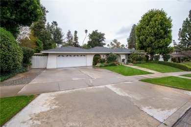 Welcome to this stunning one-story private pool home that backs on Canyon Crest Country Club in California - for sale on GolfHomes.com, golf home, golf lot