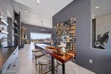 Live where the desert feels like a private resort. Perched on on Stone Canyon Club in Arizona - for sale on GolfHomes.com, golf home, golf lot