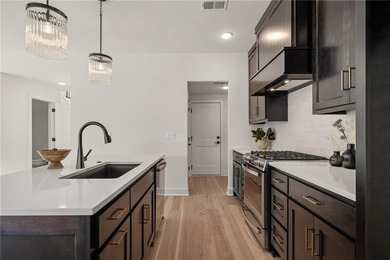 Discover modern, low-maintenance luxury living in this stunning on The Golf Club of Kansas in Kansas - for sale on GolfHomes.com, golf home, golf lot