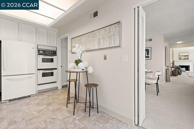 Located in desirable lagoon entry 1. PINEHURST condo upper end on Rossmoor Golf Course in California - for sale on GolfHomes.com, golf home, golf lot