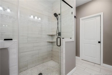 This beautifully designed Discovery Built one-story home offers on Champions Pointe Golf Course in Indiana - for sale on GolfHomes.com, golf home, golf lot