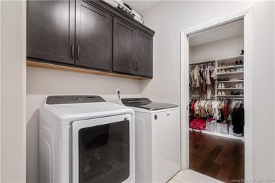 This beautifully designed Discovery Built one-story home offers on Champions Pointe Golf Course in Indiana - for sale on GolfHomes.com, golf home, golf lot