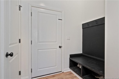 This beautifully designed Discovery Built one-story home offers on Champions Pointe Golf Course in Indiana - for sale on GolfHomes.com, golf home, golf lot