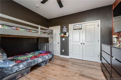 This beautifully designed Discovery Built one-story home offers on Champions Pointe Golf Course in Indiana - for sale on GolfHomes.com, golf home, golf lot