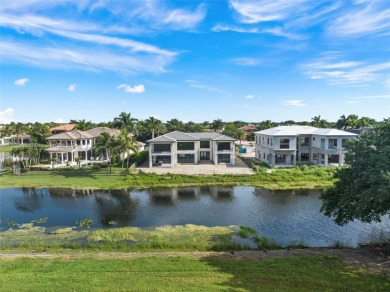 Welcome to your dream home in the exclusive Heron Estates. This on Heron Bay Golf Club in Florida - for sale on GolfHomes.com, golf home, golf lot