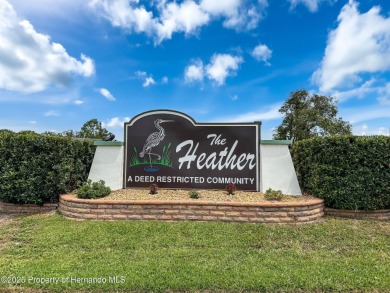 GROUND FLOOR CONDO located on the 8th Fairway of the Heather on Heather Golf and Country Club in Florida - for sale on GolfHomes.com, golf home, golf lot