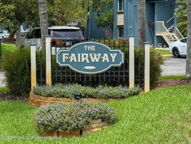 GROUND FLOOR CONDO located on the 8th Fairway of the Heather on Heather Golf and Country Club in Florida - for sale on GolfHomes.com, golf home, golf lot