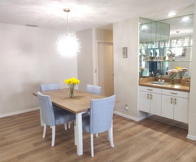 Welcome to this beautifully maintained 3BR, 2BA home in the on Martin Downs Country Club in Florida - for sale on GolfHomes.com, golf home, golf lot