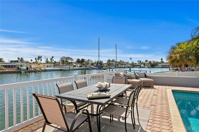 The ultimate Live-Work-Play lifestyle awaits in this beautifully on Isla Del Sol Yacht and Country Club in Florida - for sale on GolfHomes.com, golf home, golf lot