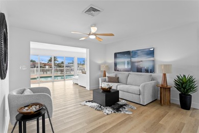 The ultimate Live-Work-Play lifestyle awaits in this beautifully on Isla Del Sol Yacht and Country Club in Florida - for sale on GolfHomes.com, golf home, golf lot