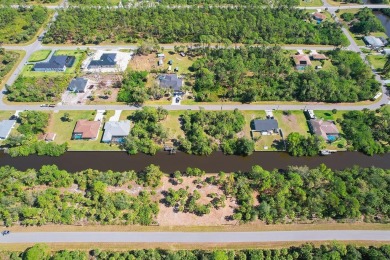 Seize the opportunity to own a prime .46-acre waterfront lot on Sabal Trace Golf and Country Club in Florida - for sale on GolfHomes.com, golf home, golf lot