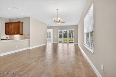 The Arbor II Townhome features a low-maintenance design with a on Plantation Bay Golf and Country Club in Florida - for sale on GolfHomes.com, golf home, golf lot
