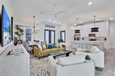 Experience modern Florida living at its finest in this stunning on Raptor Bay Golf Club in Florida - for sale on GolfHomes.com, golf home, golf lot