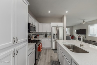 Beautifully reimagined, this 3-bedroom, 2-bath residence is on Arizona Traditions Golf Club in Arizona - for sale on GolfHomes.com, golf home, golf lot