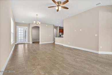 The Arbor II Townhome features a low-maintenance design with a on Plantation Bay Golf and Country Club in Florida - for sale on GolfHomes.com, golf home, golf lot