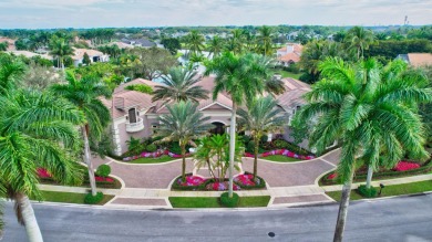 Situated on a double-lot with expansive lake views, highly on Broken Sound Golf and Club  in Florida - for sale on GolfHomes.com, golf home, golf lot