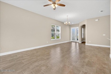The Arbor II Townhome features a low-maintenance design with a on Plantation Bay Golf and Country Club in Florida - for sale on GolfHomes.com, golf home, golf lot