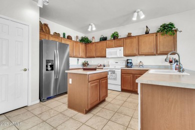 This well-maintained  Sunrise Model home offers a welcoming on Lone Tree Golf Club in Arizona - for sale on GolfHomes.com, golf home, golf lot