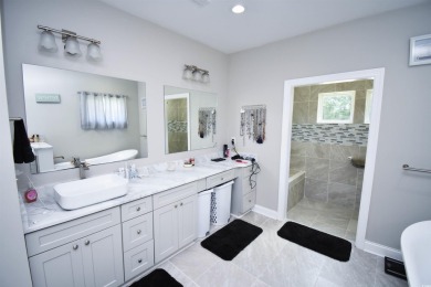 This beautifully landscaped property is situated directly on the on Wild Wing Plantation in South Carolina - for sale on GolfHomes.com, golf home, golf lot