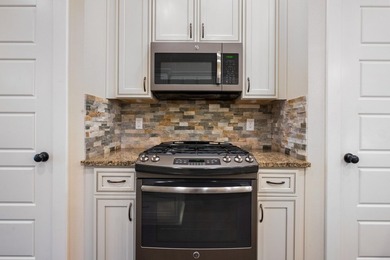 Located in Bluewater Bay in Niceville, Florida, this newer home on Fairway Oaks at Magnolia Golf Course in Florida - for sale on GolfHomes.com, golf home, golf lot