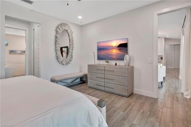 Experience modern Florida living at its finest in this stunning on Raptor Bay Golf Club in Florida - for sale on GolfHomes.com, golf home, golf lot
