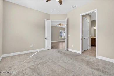 The Arbor II Townhome features a low-maintenance design with a on Plantation Bay Golf and Country Club in Florida - for sale on GolfHomes.com, golf home, golf lot