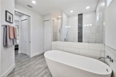 Experience modern Florida living at its finest in this stunning on Raptor Bay Golf Club in Florida - for sale on GolfHomes.com, golf home, golf lot