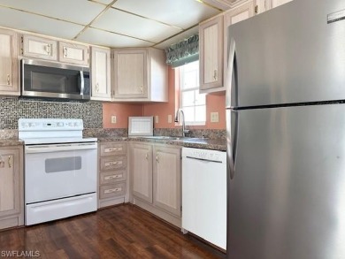Open floor plan, high ceilings, a true 2Br/2Ba, and new roof in on The Rookery At Marco in Florida - for sale on GolfHomes.com, golf home, golf lot