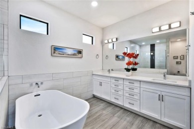 Experience modern Florida living at its finest in this stunning on Raptor Bay Golf Club in Florida - for sale on GolfHomes.com, golf home, golf lot