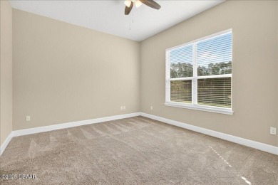 The Arbor II Townhome features a low-maintenance design with a on Plantation Bay Golf and Country Club in Florida - for sale on GolfHomes.com, golf home, golf lot