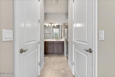 The Arbor II Townhome features a low-maintenance design with a on Plantation Bay Golf and Country Club in Florida - for sale on GolfHomes.com, golf home, golf lot