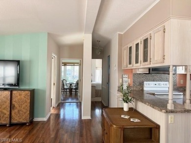 Open floor plan, high ceilings, a true 2Br/2Ba, and new roof in on The Rookery At Marco in Florida - for sale on GolfHomes.com, golf home, golf lot