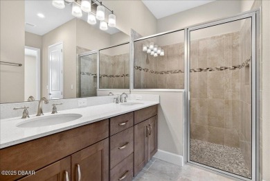 The Arbor II Townhome features a low-maintenance design with a on Plantation Bay Golf and Country Club in Florida - for sale on GolfHomes.com, golf home, golf lot