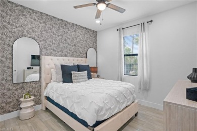 Experience modern Florida living at its finest in this stunning on Raptor Bay Golf Club in Florida - for sale on GolfHomes.com, golf home, golf lot