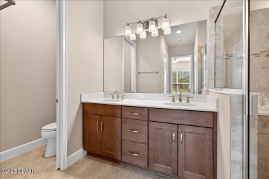 The Arbor II Townhome features a low-maintenance design with a on Plantation Bay Golf and Country Club in Florida - for sale on GolfHomes.com, golf home, golf lot