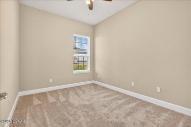 The Arbor II Townhome features a low-maintenance design with a on Plantation Bay Golf and Country Club in Florida - for sale on GolfHomes.com, golf home, golf lot
