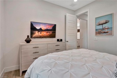 Experience modern Florida living at its finest in this stunning on Raptor Bay Golf Club in Florida - for sale on GolfHomes.com, golf home, golf lot