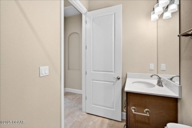 The Arbor II Townhome features a low-maintenance design with a on Plantation Bay Golf and Country Club in Florida - for sale on GolfHomes.com, golf home, golf lot