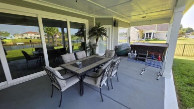 This beautifully landscaped property is situated directly on the on Wild Wing Plantation in South Carolina - for sale on GolfHomes.com, golf home, golf lot