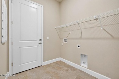 The Arbor II Townhome features a low-maintenance design with a on Plantation Bay Golf and Country Club in Florida - for sale on GolfHomes.com, golf home, golf lot