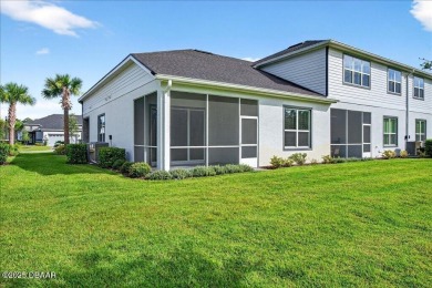 The Arbor II Townhome features a low-maintenance design with a on Plantation Bay Golf and Country Club in Florida - for sale on GolfHomes.com, golf home, golf lot