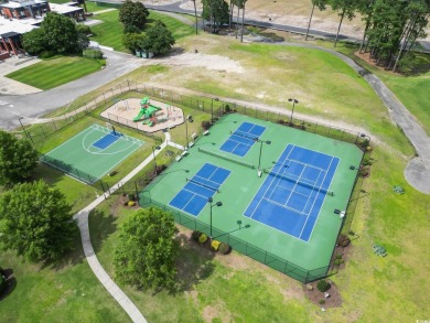 This beautifully landscaped property is situated directly on the on Myrtle Beach National Golf Course in South Carolina - for sale on GolfHomes.com, golf home, golf lot