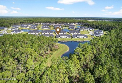 The Arbor II Townhome features a low-maintenance design with a on Plantation Bay Golf and Country Club in Florida - for sale on GolfHomes.com, golf home, golf lot