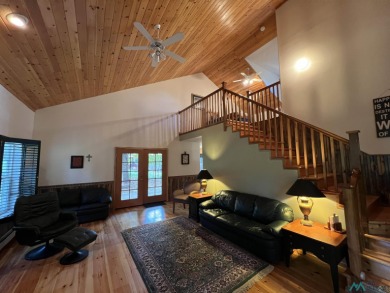 Discover this sweet mountain cabin perfectly situated along the on Pendaries Village Community Assoc. in New Mexico - for sale on GolfHomes.com, golf home, golf lot